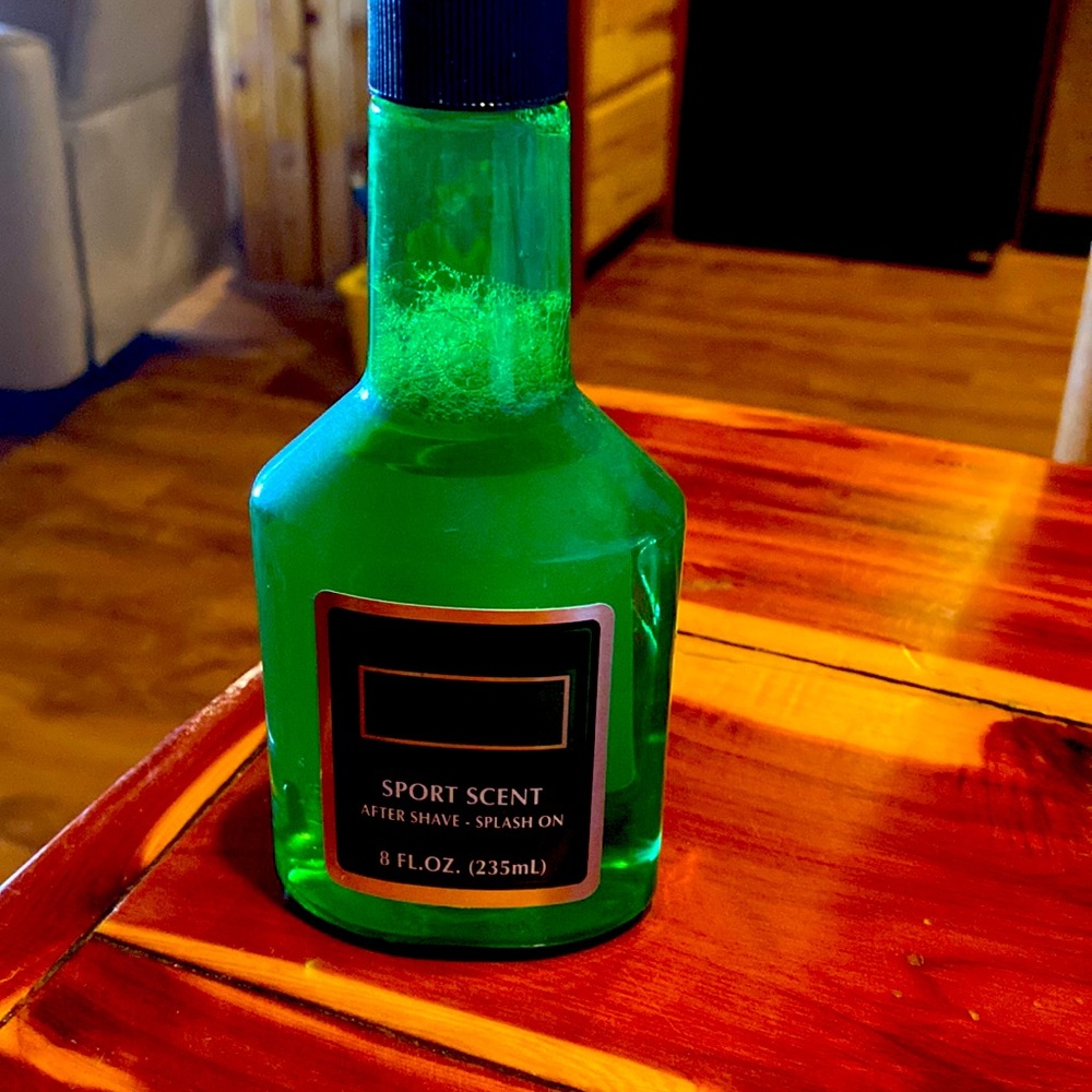 8oz of Macho Sport Scent aftershave.